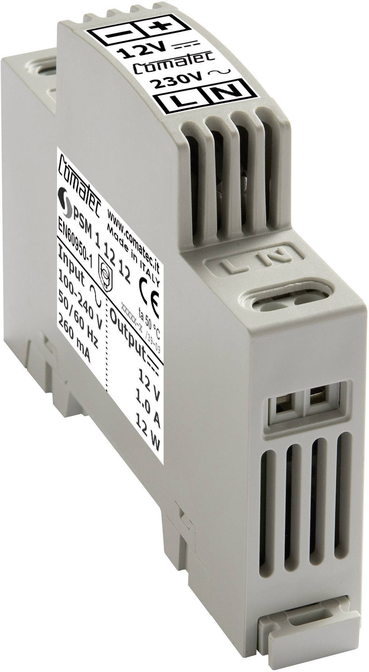 Une alimentation grise de Comatec avec une puissance d'entrée de 230V et une sortie de 12V, adaptée aux boîtiers électriques, vue de côté.