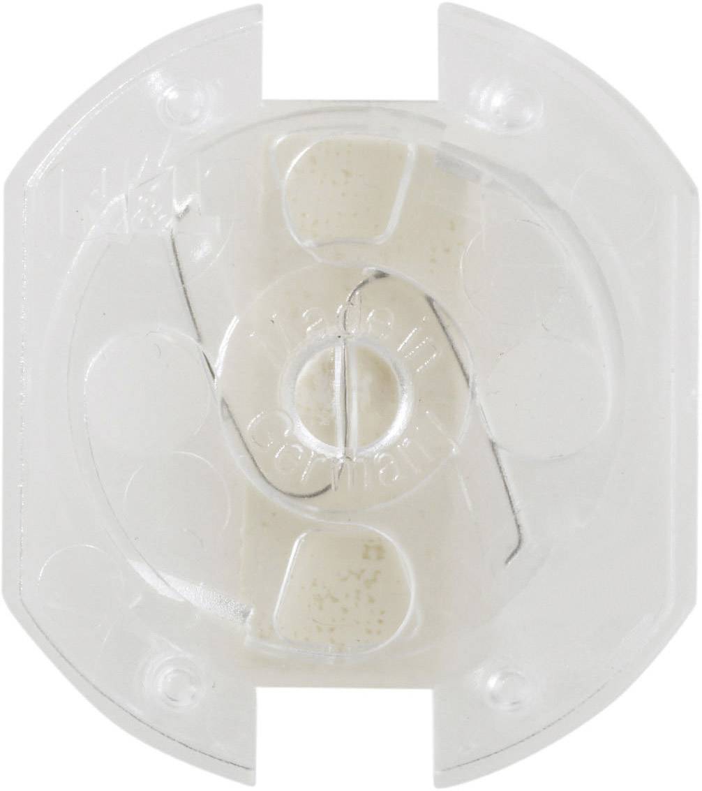 Une ouverture circulaire transparente en plastique avec des repères au centre d'un couvercle rectangulaire en plastique.