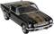 Voiture miniature noire avec des bandes dorées sur le capot et le toit, design sportif, vue de face montrant la calandre et les phares.