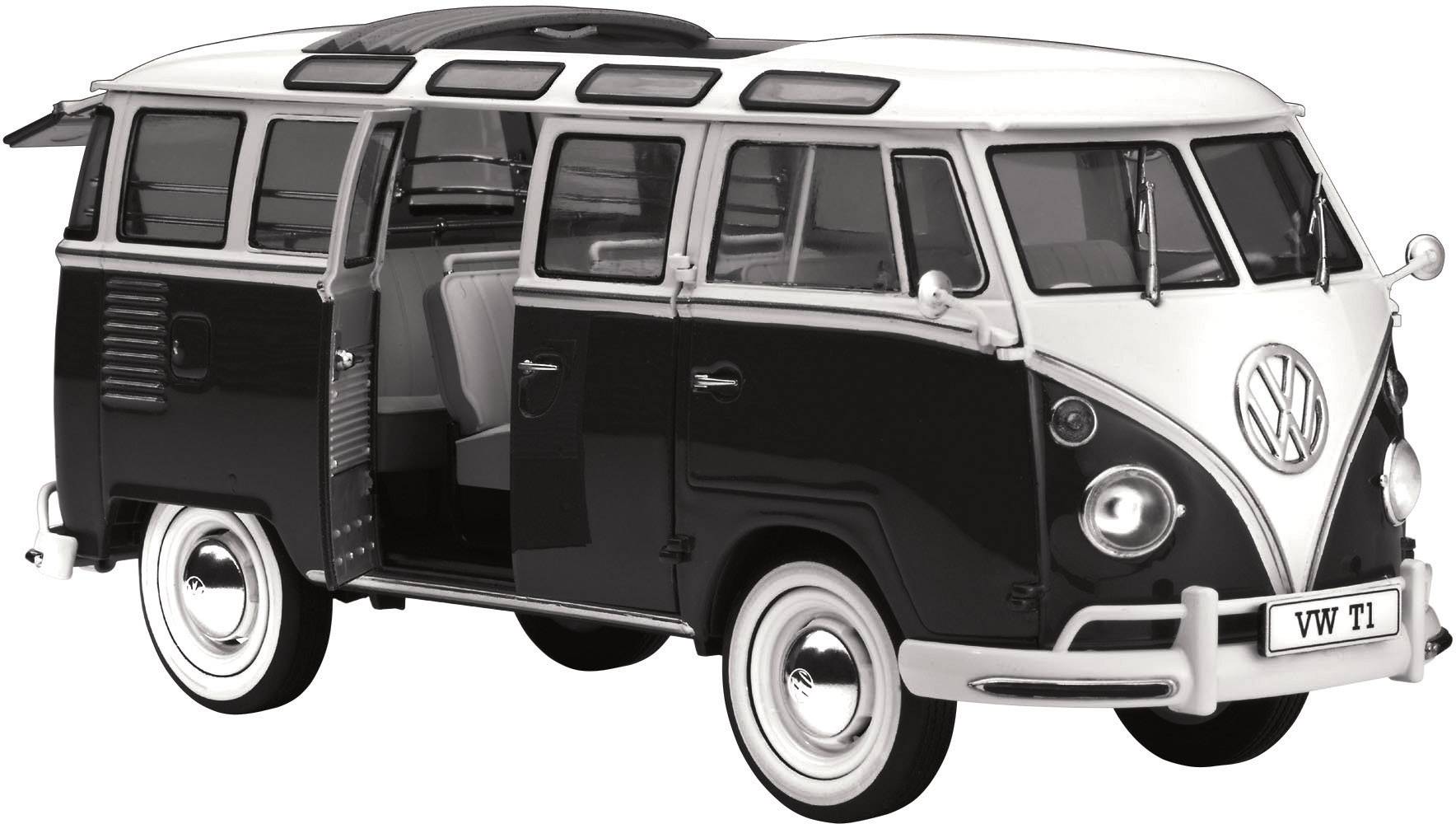Un combi Volkswagen T1 noir aux portes ouvertes, montrant son intérieur. Le bus est garé sur une surface blanche et est photographié de profil.