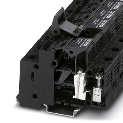 Un bloc de fusibles électrique noir avec plusieurs fusibles, adapté aux applications industrielles.