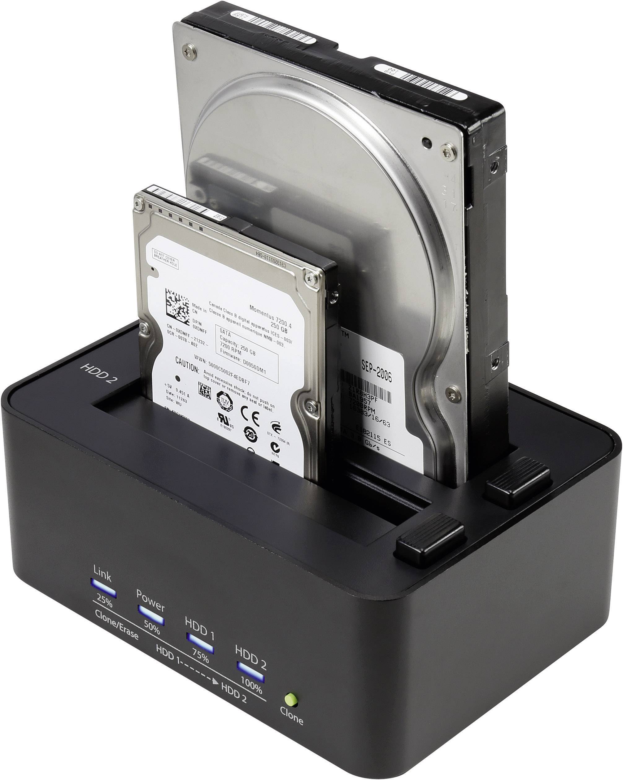 Deux disques durs sont insérés dans une station d'accueil externe. Un plus grand, un plus petit. Voyants "Power" et "HDD 1/2".