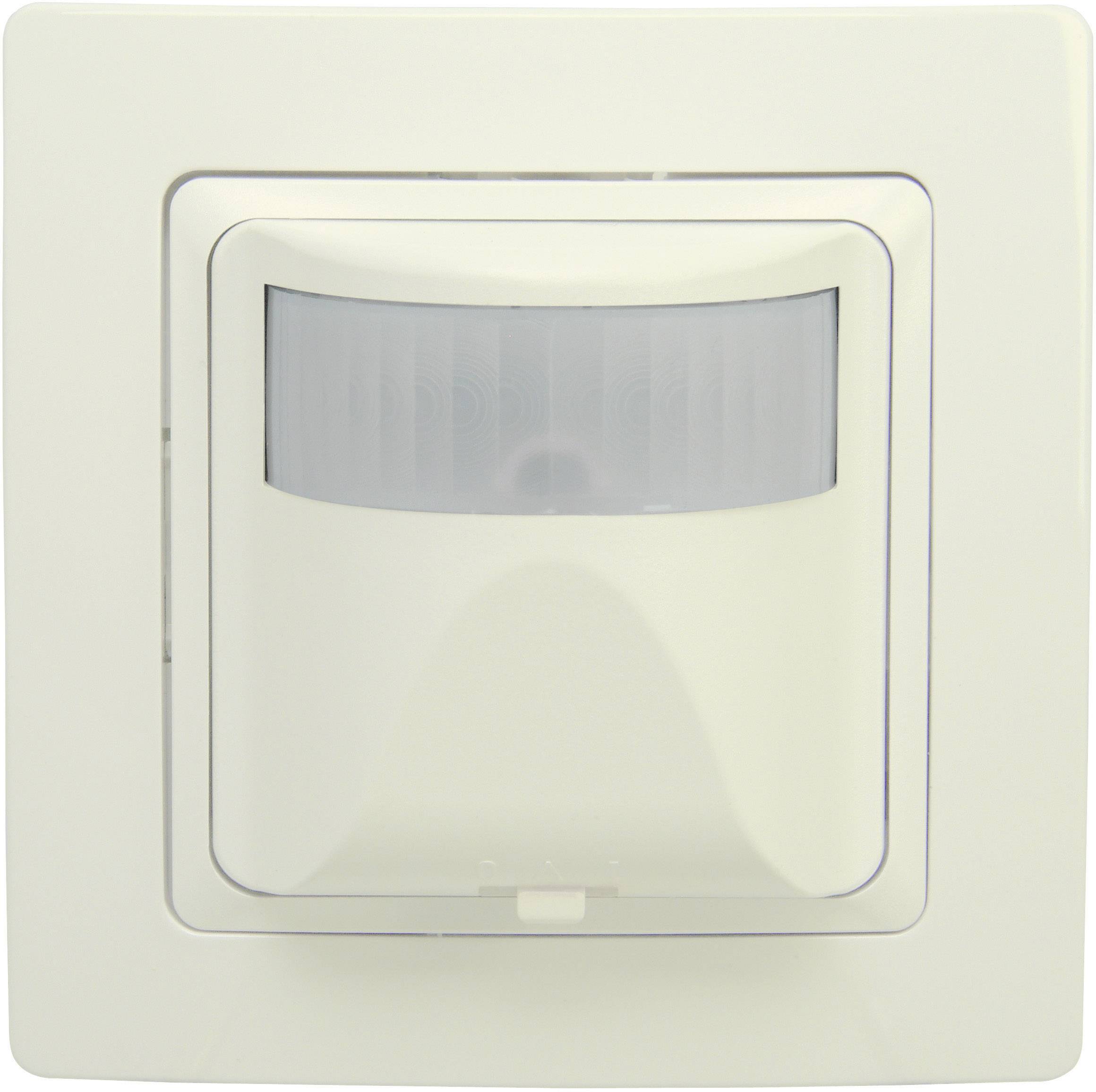 Un détecteur de mouvement blanc au design rectangulaire, fixé sur un mur. Le capteur détecte les mouvements pour le contrôle automatique de l'éclairage.