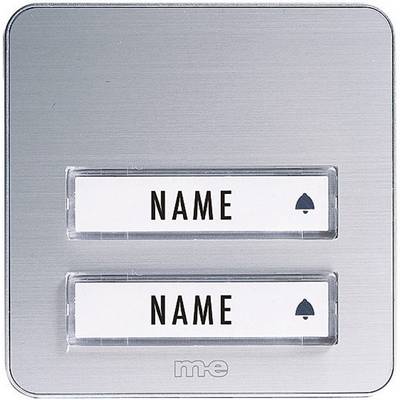 Deux plaques nominatives sur une plaque de sonnette métallique, chacune avec un texte d'espace réservé 'NOM', accompagnées chacune d'un petit symbole.