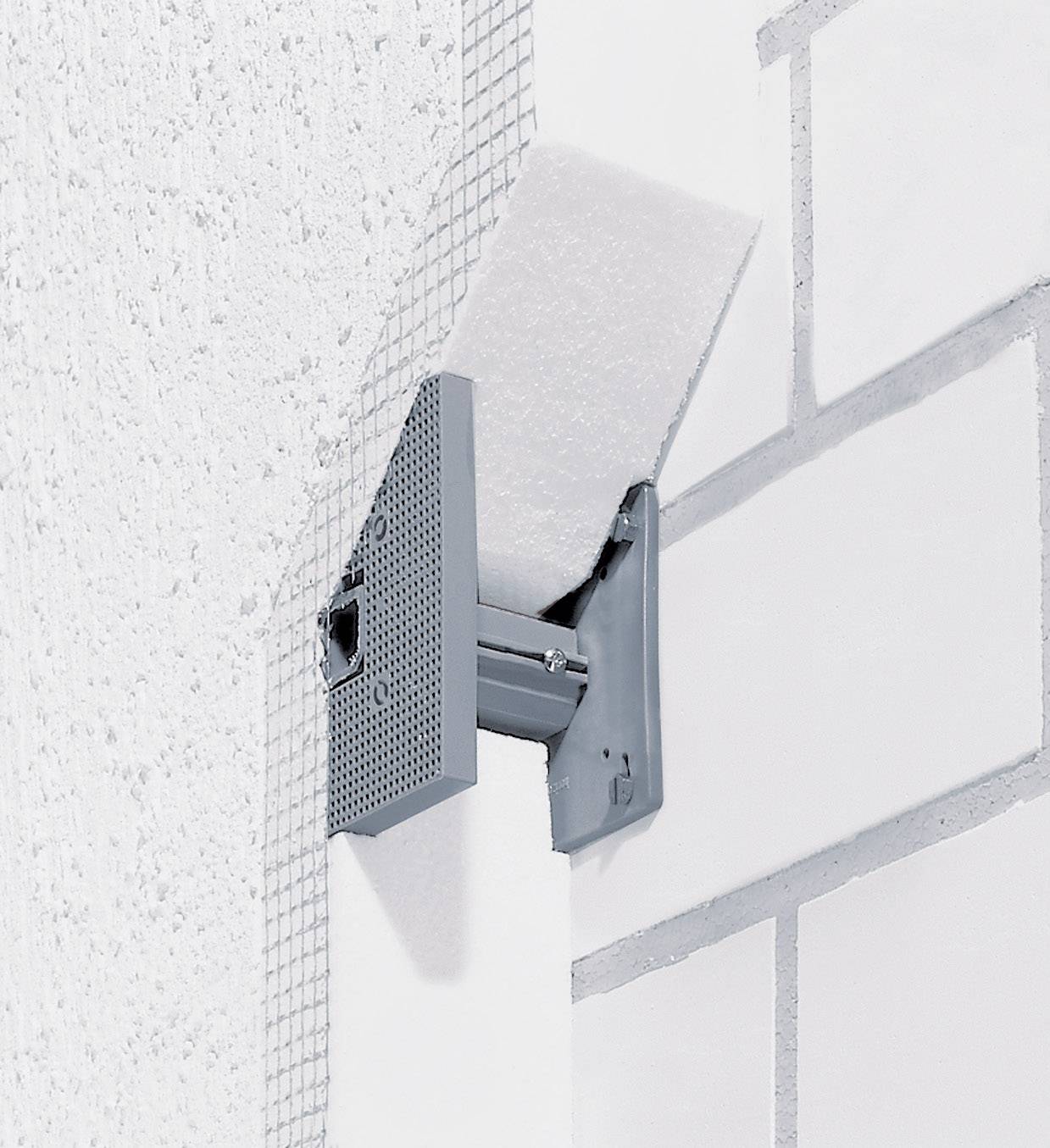 Une illustration détaillée d'un profil de finition murale dans un système d'isolation thermique par l'extérieur. Montre la connexion entre la façade et l'isolation.