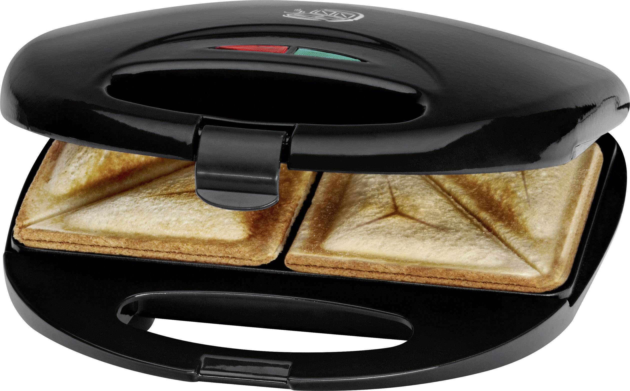 Un sandwich maker avec deux sandwichs dorés et croustillants.