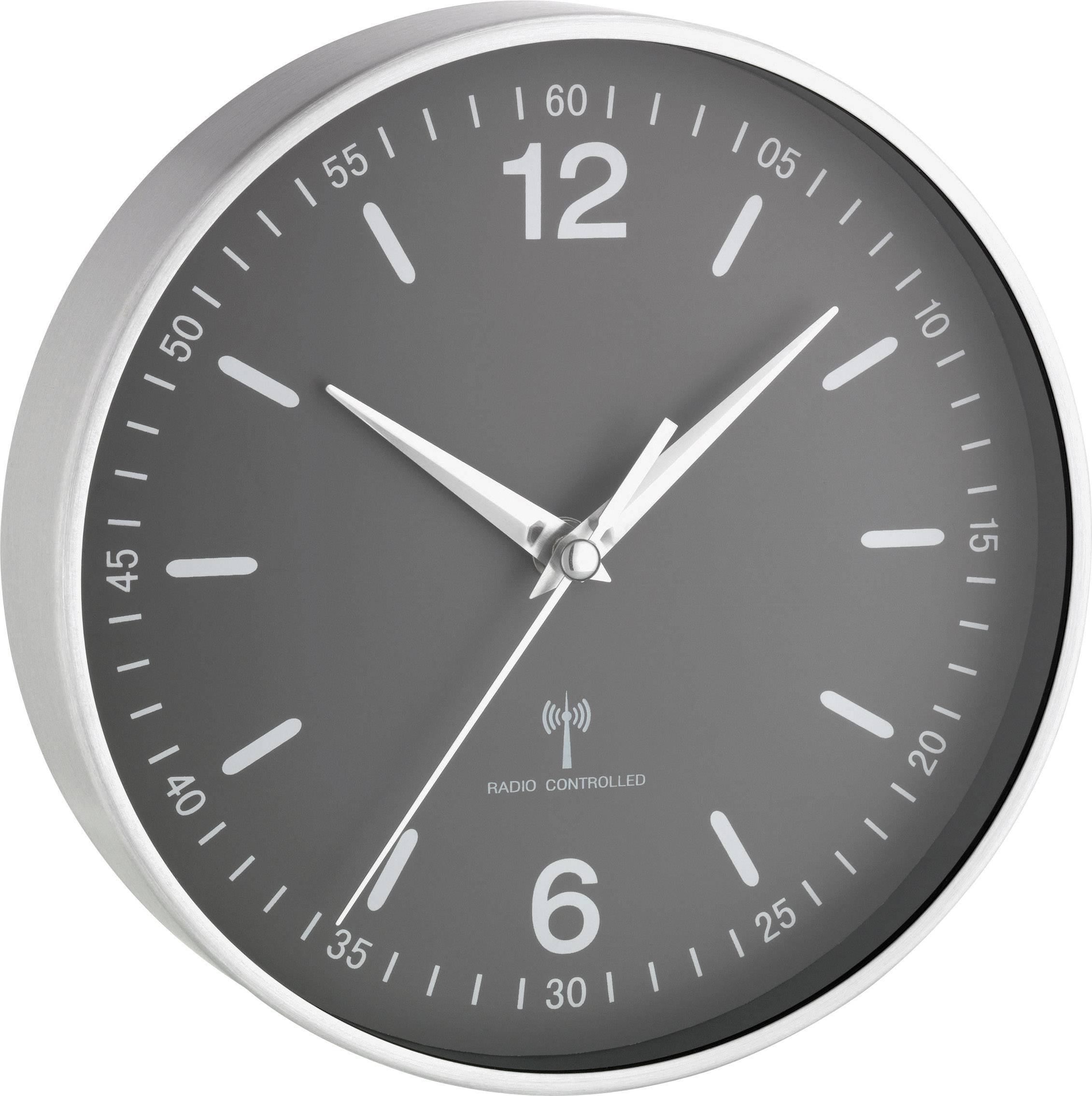 Une horloge murale ronde, grise avec un cadre argenté, indique 10h10. L'horloge présente des chiffres blancs et des traits pour marquer les minutes.