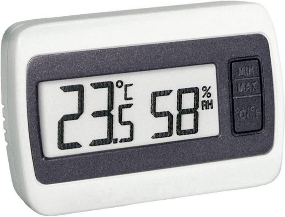 Un thermomètre numérique affiche 23 degrés Celsius et 58 pour cent d'humidité.