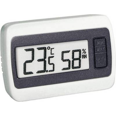 Un thermomètre numérique affiche 23 degrés Celsius et 58 pour cent d'humidité.