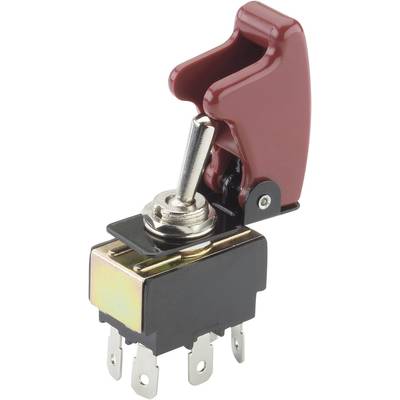 Un interrupteur à bascule avec un capot rouge et plusieurs broches métalliques, généralement utilisé pour commander des appareils électriques.