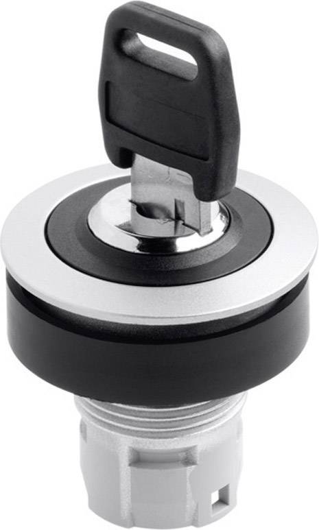 Un interrupteur métallique rond avec une clé en plastique noir. La clé est insérée dans l'interrupteur et positionnée verticalement.
