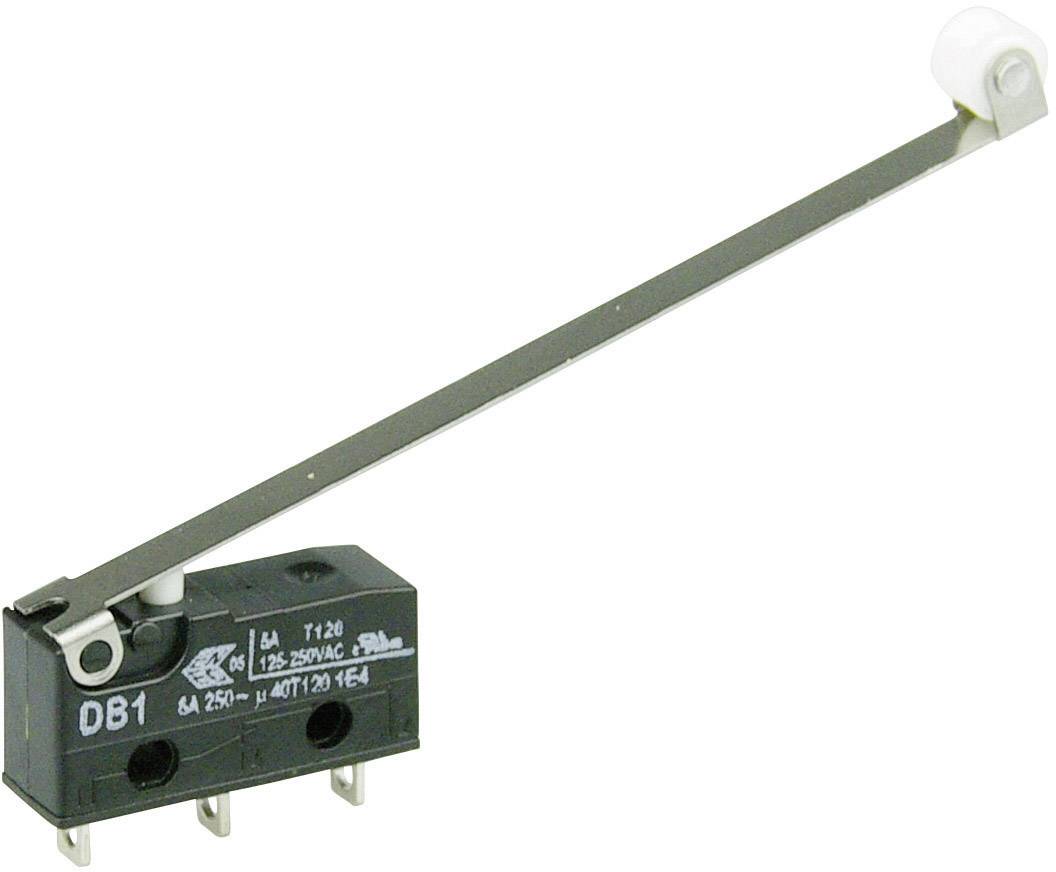 Un microrupteur avec un long levier et une tête de rouleau blanche. Le commutateur est noir et possède trois bornes.