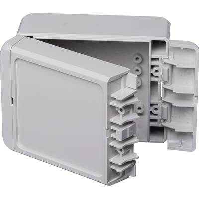 Boîtier en plastique gris rectangulaire avec couvercle ouvert. À l'intérieur, on peut voir des éléments de fixation et des chemins de câbles.
