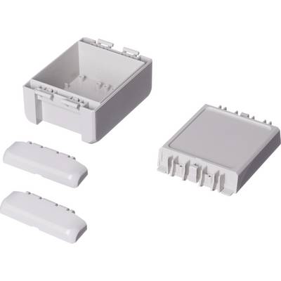 Boîte en plastique blanc, partiellement ouverte avec des couvercles amovibles nervurés. Adaptée pour les composants électroniques.