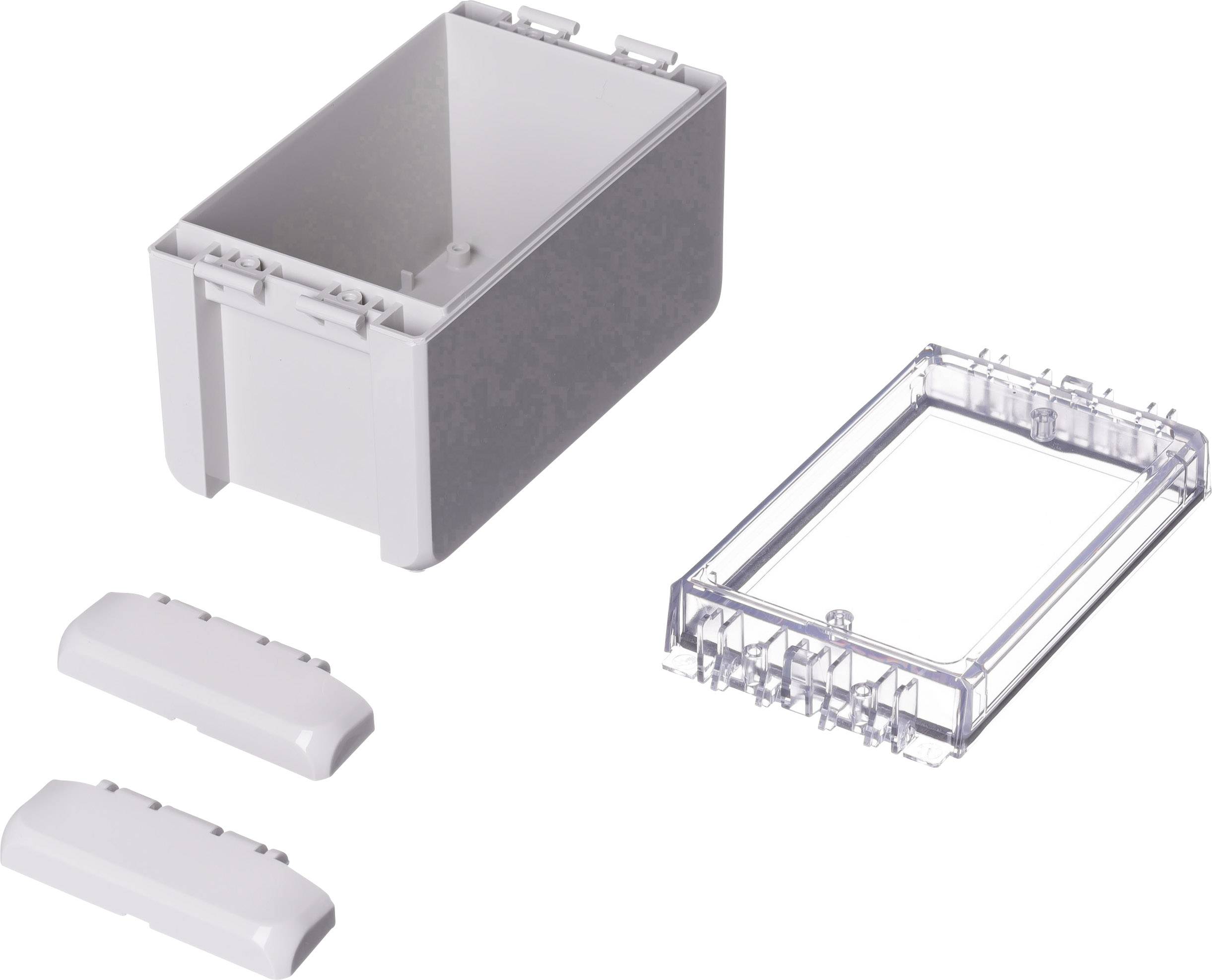 Un récipient rectangulaire en plastique transparent avec un couvercle amovible et deux pièces en plastique blanc aux bords arrondis.