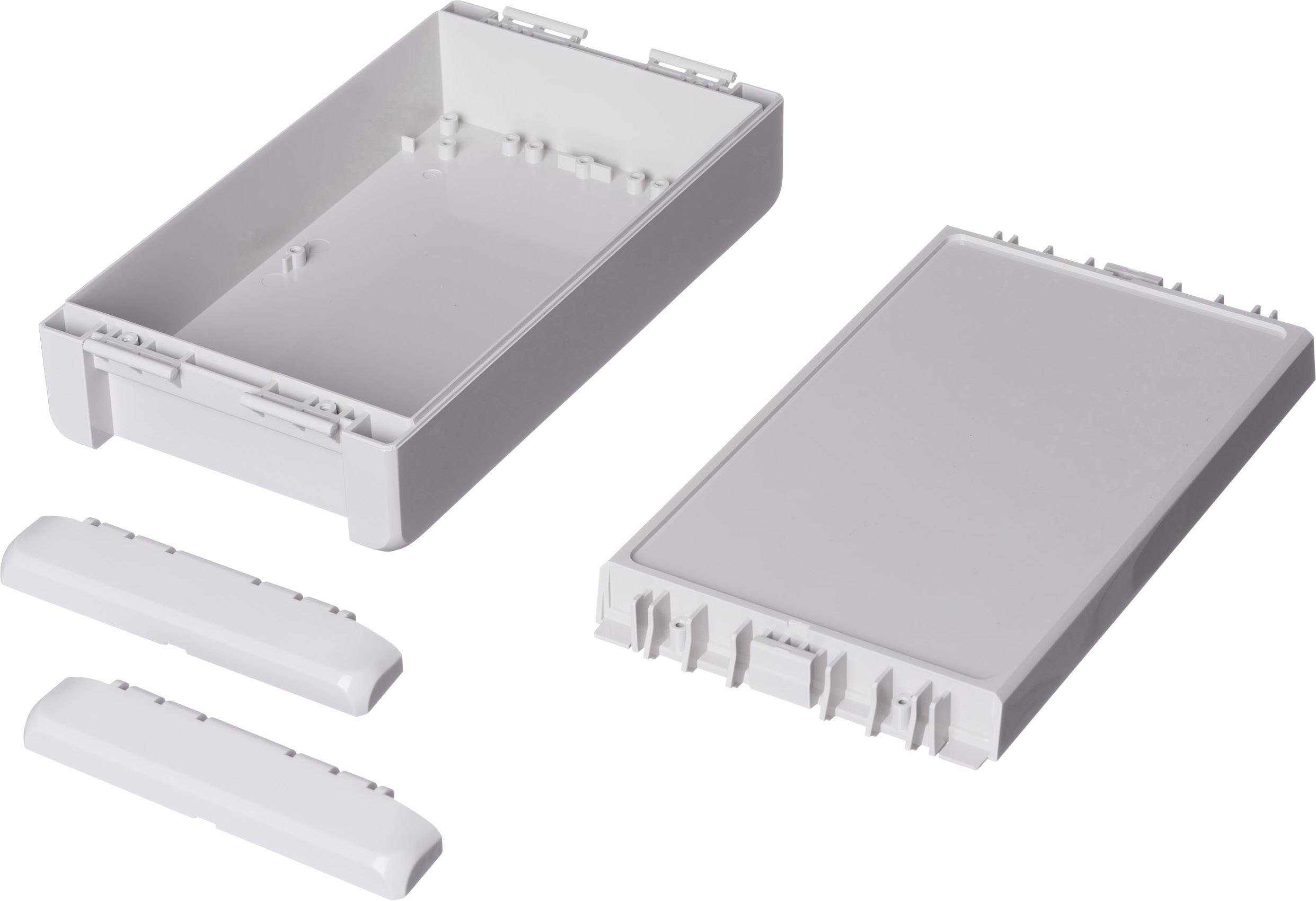 Un ensemble de boîtier composé d'un boîtier ouvert blanc, d'un couvercle assorti et de deux petites couvertures, probablement destiné à des composants électroniques.