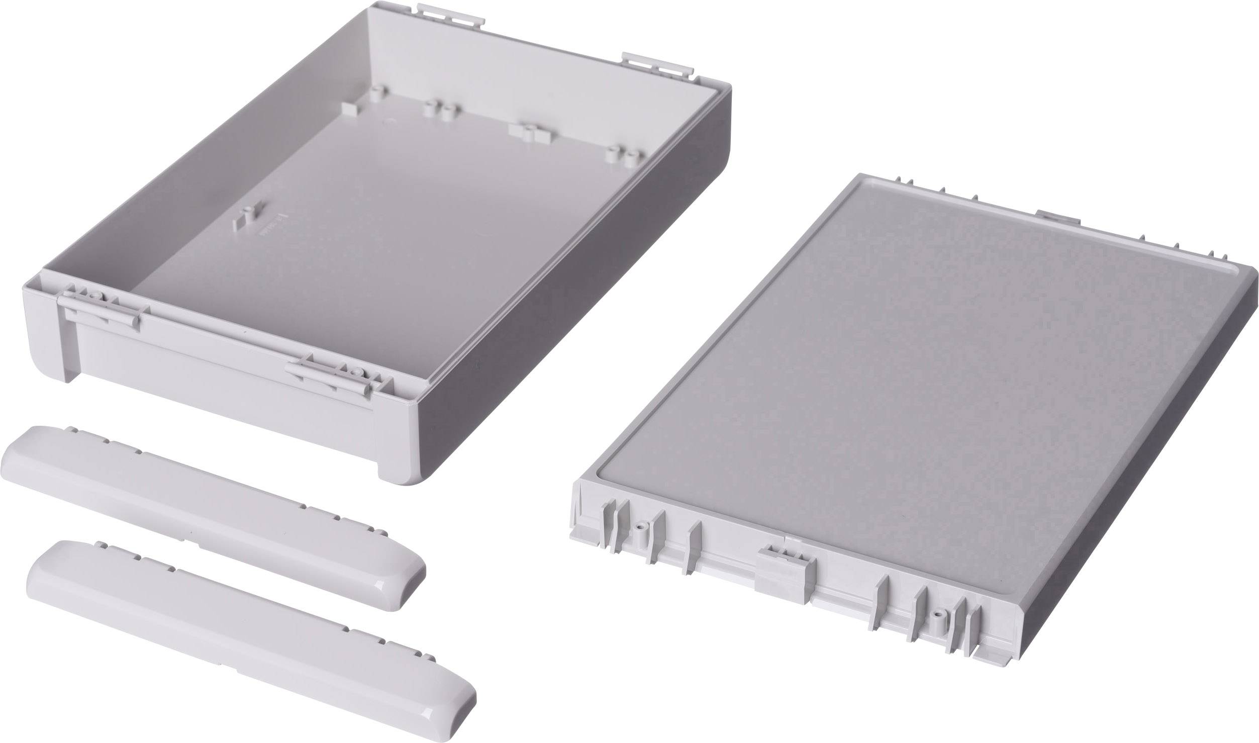 Boîtier en plastique en pièces détachées : couvercle, fond et côtés ; adapté pour le montage électronique.