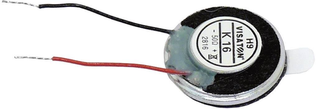 Petit haut-parleur rond avec deux câbles, l'un rouge et l'autre noir, fixé sur un corps métallique portant une étiquette.