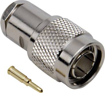 Un connecteur coaxial argenté et un contact doré. Le connecteur présente une surface rainurée pour une meilleure prise en main.