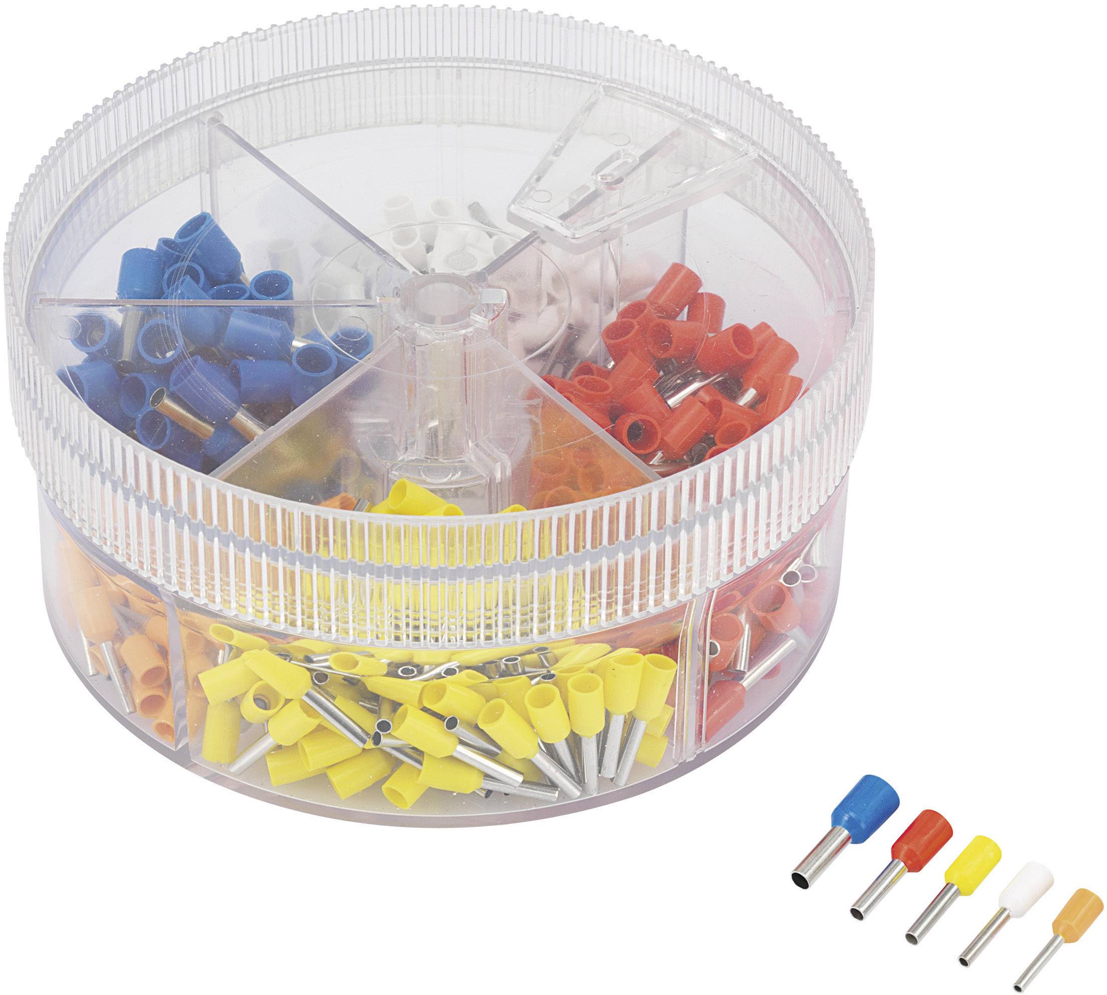 Récipient rond et transparent contenant des cosses de câble triées par couleurs : bleu, rouge, jaune et blanc.