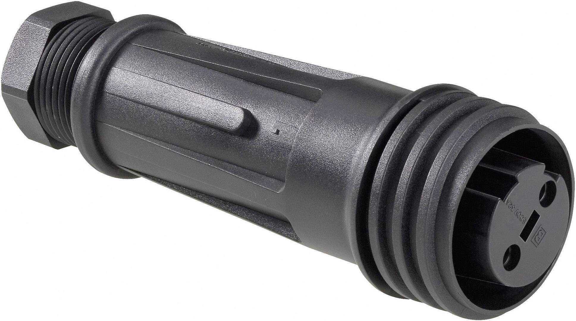Un connecteur noir pour câbles électriques avec surface striée et plusieurs rainures pour une connexion sécurisée.