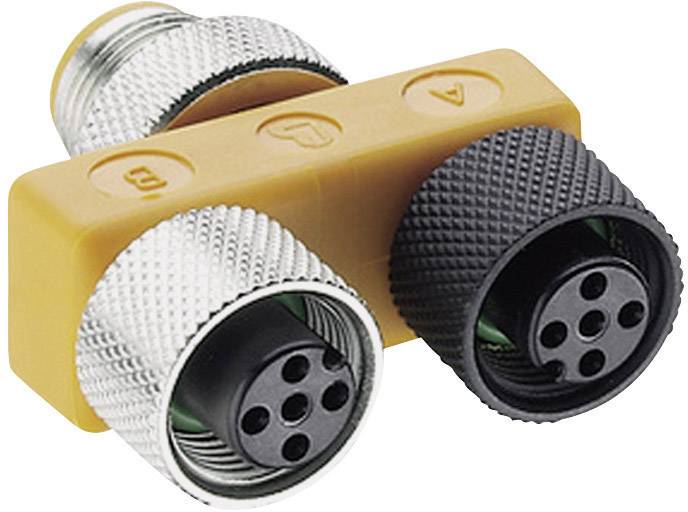 Un té jaune à trois raccords circulaires. Deux couplages noirs à droite et à gauche, un couplage métallique en haut.