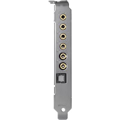 Verso d'une carte son avec six connecteurs audio ronds et un connecteur optique, étiquetés avec des désignations pour différents signaux audio.