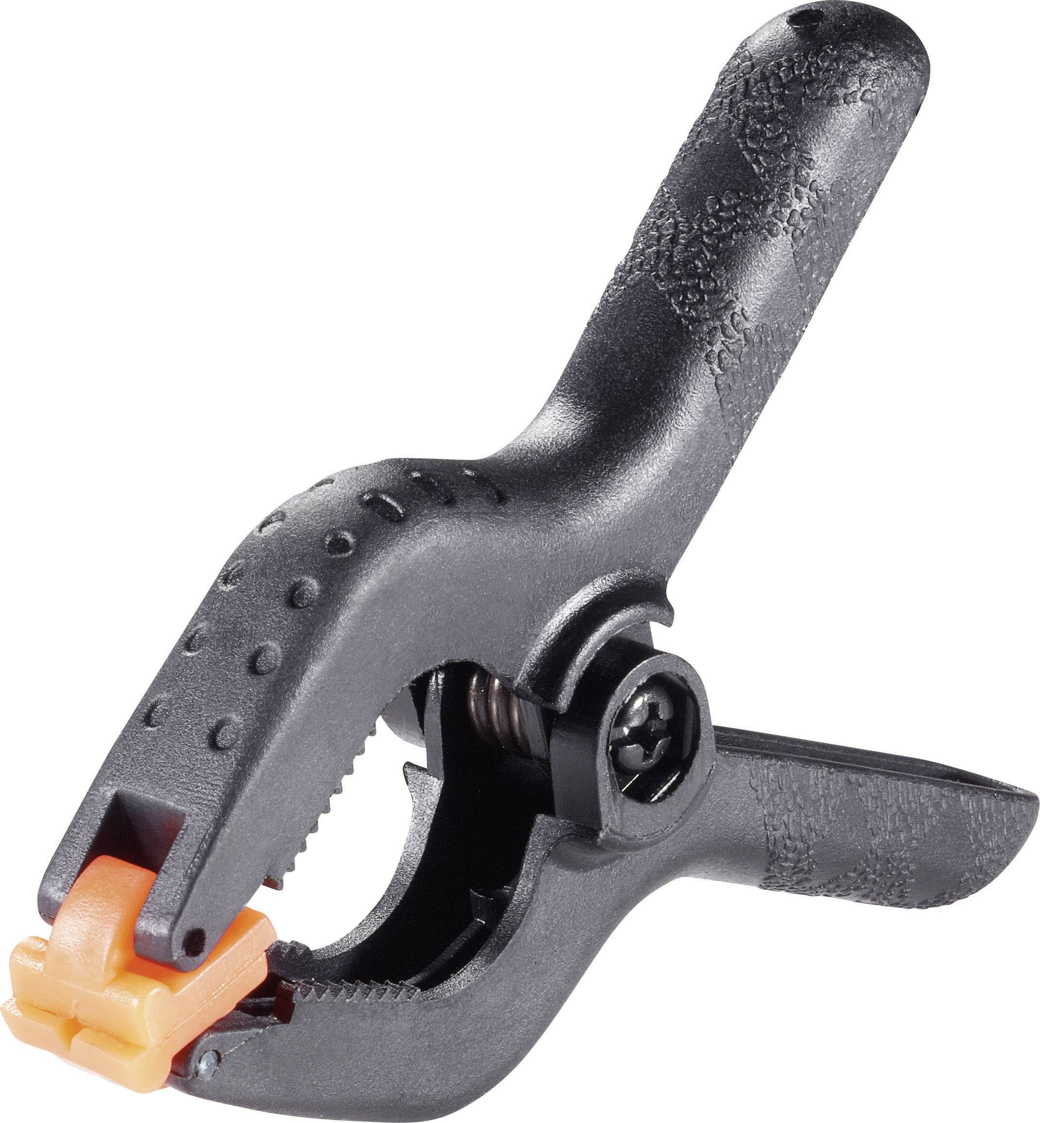 Une pince en plastique noir avec des extrémités orange, prête à maintenir ou à stabiliser des objets.