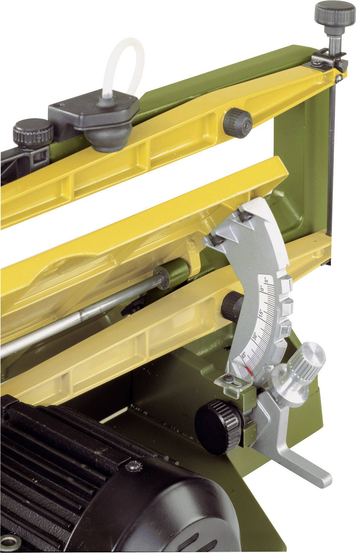Composant mécanique avec des éléments jaunes et verts, bouton de réglage et échelle. Adapté pour des travaux de réglage précis.