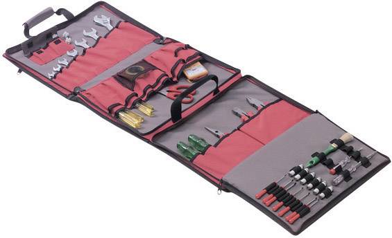 Un sac à outils ouvert contenant divers outils manuels, notamment des tournevis, des clés à molette et des pinces, soigneusement rangés.