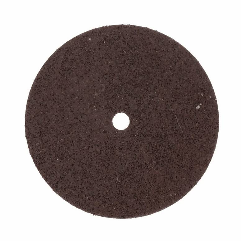 Un disque abrasif rond avec un trou central, à surface granuleuse, sur un fond blanc. Adapté pour les travaux de meulage.