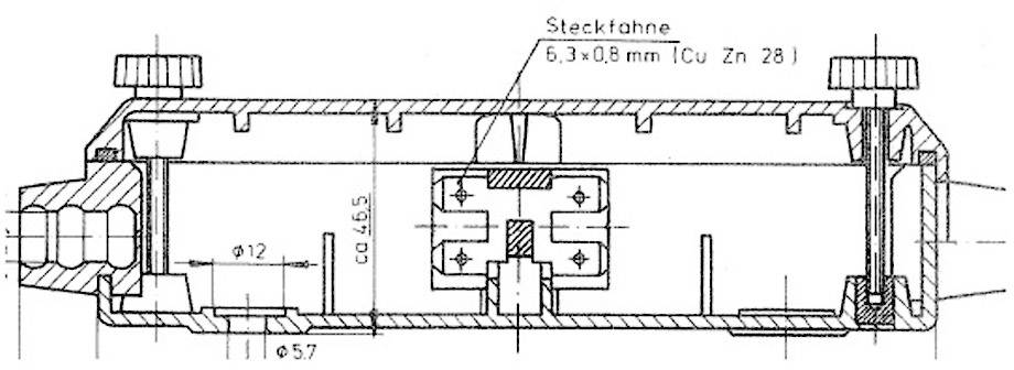 Dessin technique d'un composant cylindrique avec des drapeaux de repérage. Présente les dimensions et une vue en coupe.