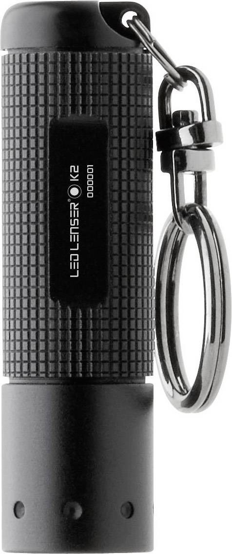 Petite lampe de poche noire avec anneau porte-clés, compacte et texturée pour une meilleure prise en main, adaptée pour être accrochée aux clés.