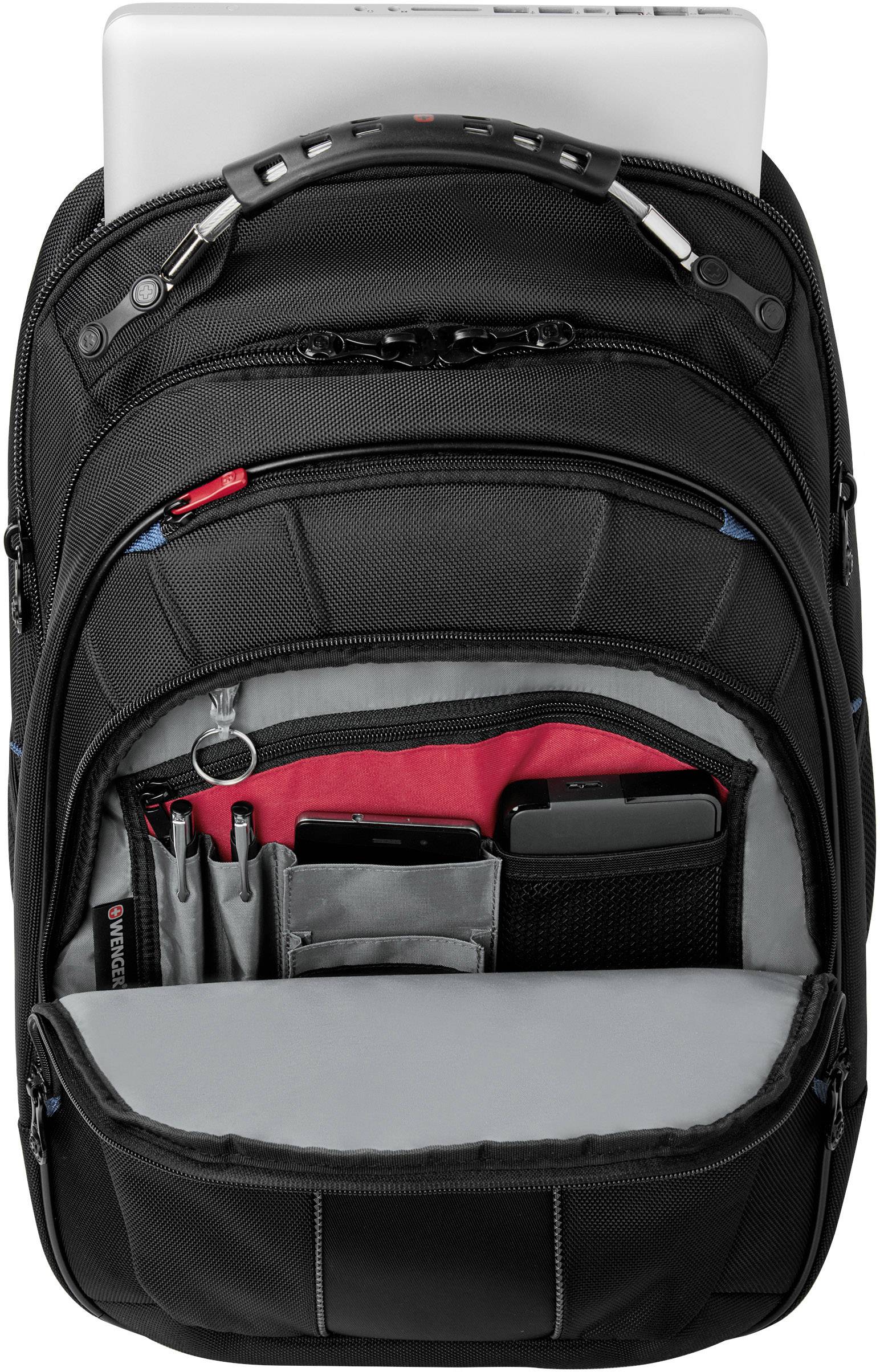 Sac à dos noir avec compartiment ouvert, montrant les différents compartiments et un porte-stylos. Un ordinateur portable est rangé en haut du sac à dos.
