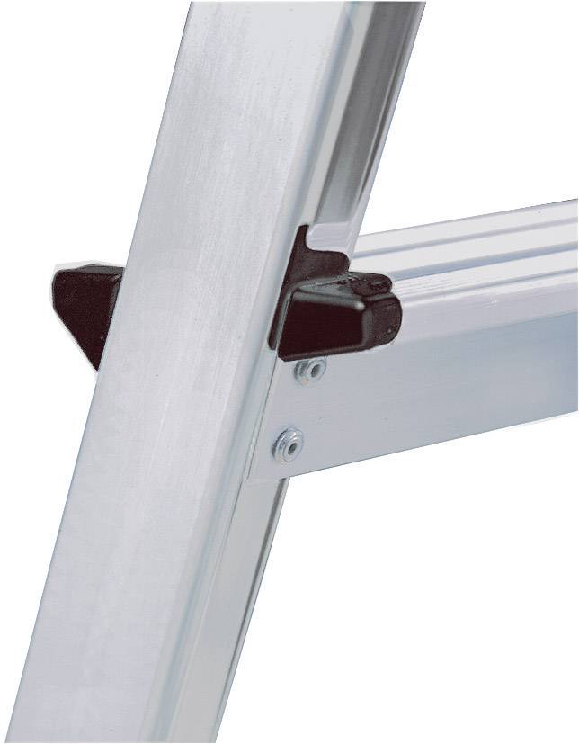 Gros plan d'un clip en aluminium sur une échelle, maintenant fermement les marches.