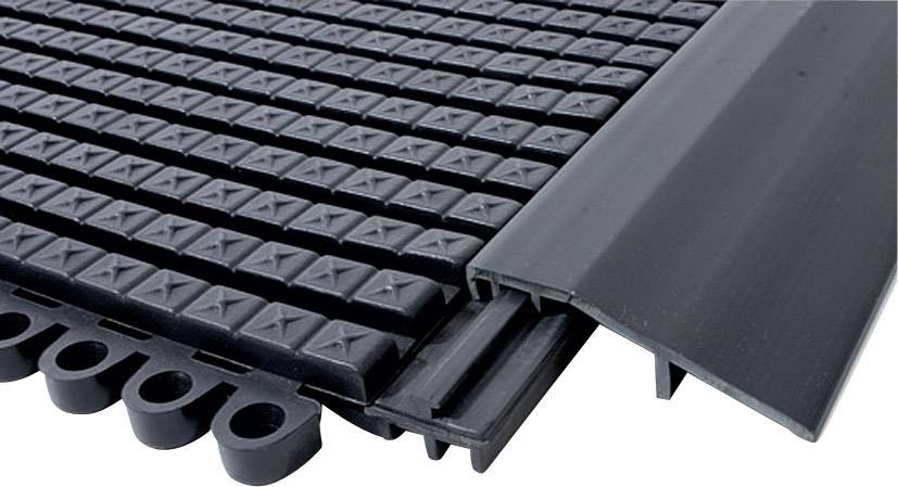 Tapis de caoutchouc noir avec profil antidérapant et bords biseautés. Idéal pour les zones d'entrée ou les sols d'atelier pour la protection et le confort.