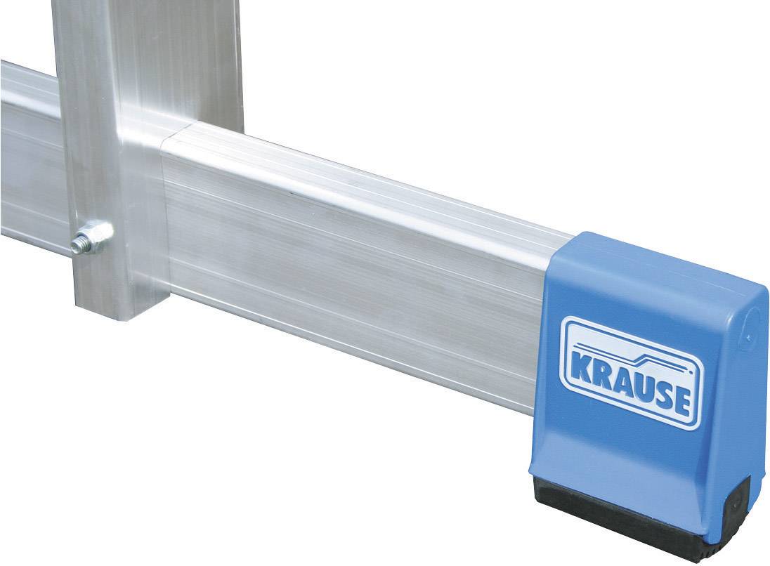 Une pièce en plastique bleue portant l'inscription « Krause » se trouve à l'extrémité d'un profilé en aluminium, probablement un élément d'un échafaudage.