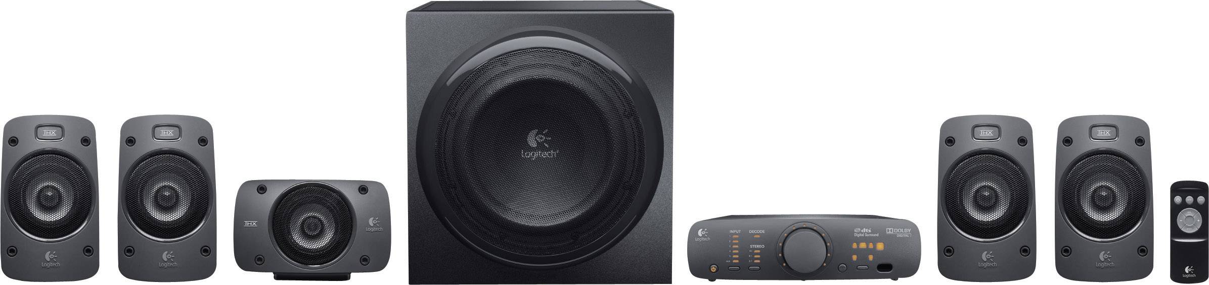 Système audio surround composé de six enceintes, d'un caisson de basses et d'une télécommande, idéal pour les configurations de cinéma maison.