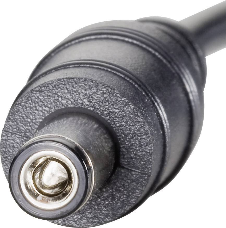 Gros plan d'une fiche cylindrique noire avec contact métallique, probablement un connecteur de courant continu, sur un fond neutre.