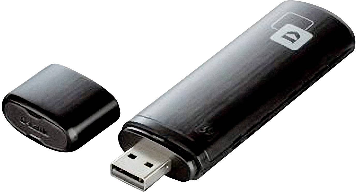 Une clé USB noire avec son capuchon retiré, posé à côté.