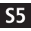 'Block S5' sur un panneau carré noir. L'arrière-plan est sombre.