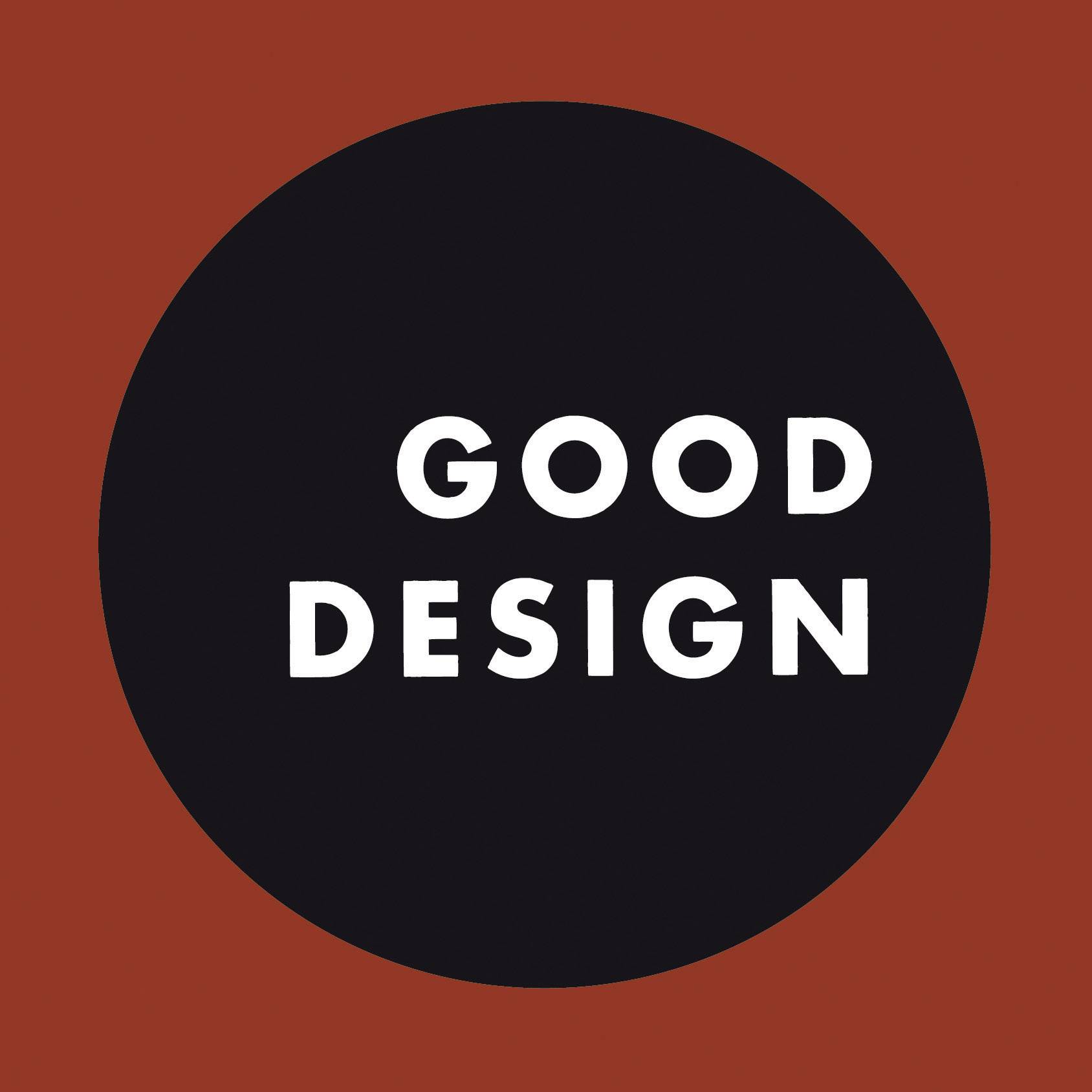 Un cercle noir sur un fond rouge avec le texte blanc 'GOOD DESIGN' au centre.