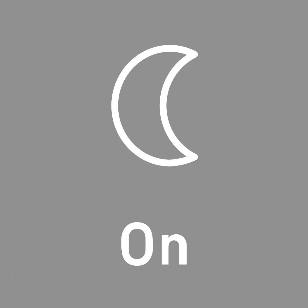 Symbole de lune avec le mot « On » en dessous, indiquant que le mode nuit ou le mode veille est activé.