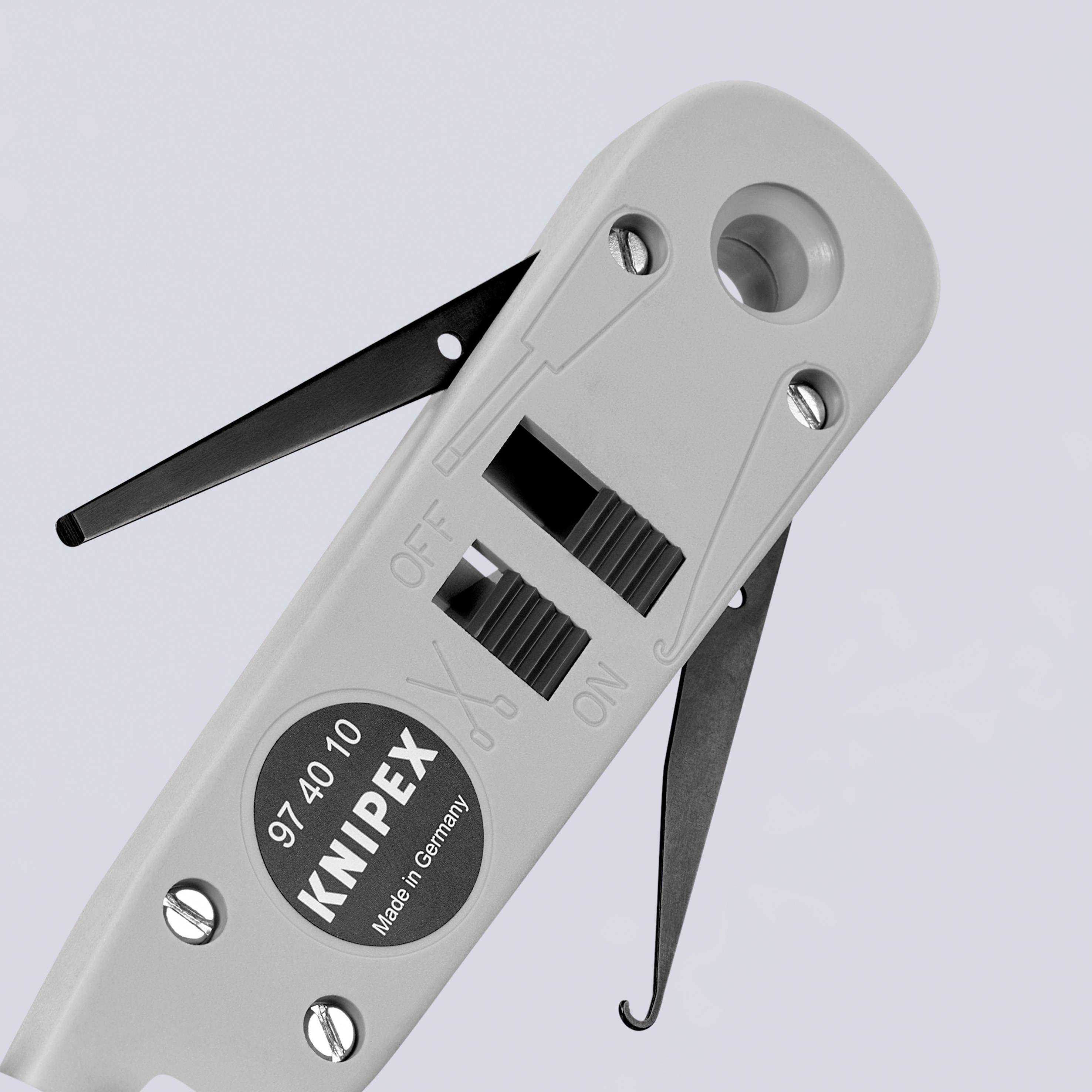 Alat za skidanje izolacije s kabela, model 'Knipex 9740 10', s kliznom trakom za otvaranje i zatvaranje, izrađen u Njemačkoj.