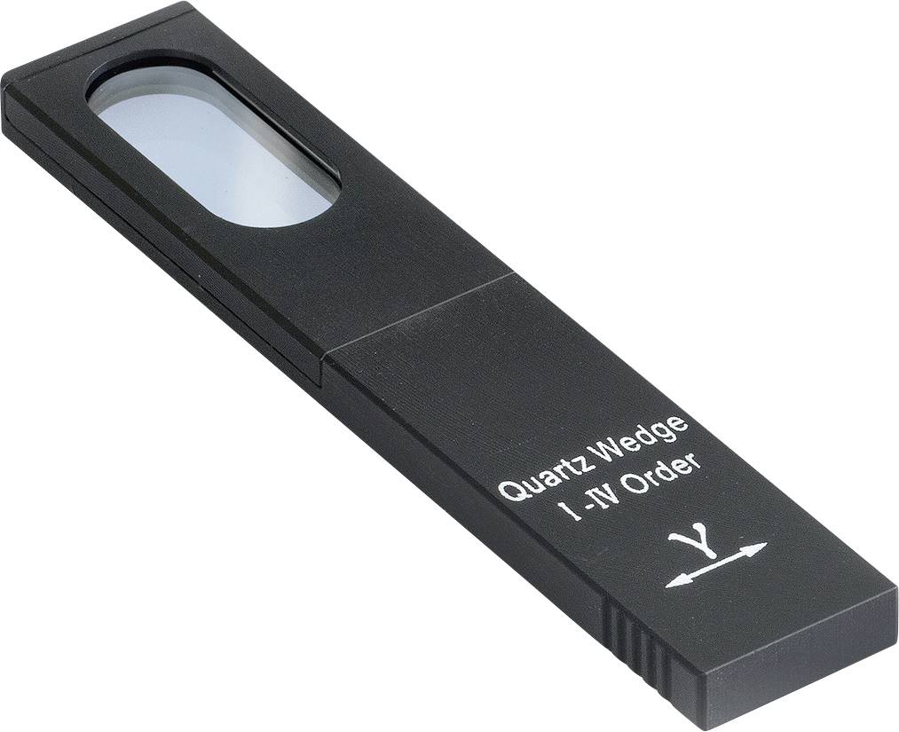 Crni kvarcni klinasti uređaj, obilježen oznakom 'Quartz Wedge I. IV Order', i strelicom na donjem dijelu, koristi se za optička mjerenja.