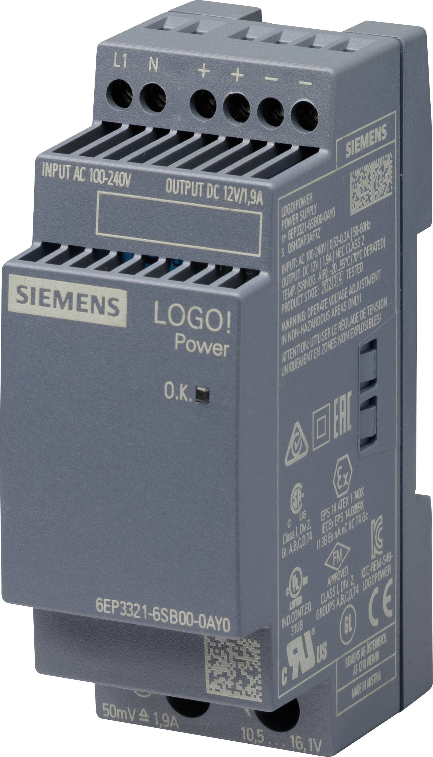 Automatizacijski modul u sivoj boji sa Siemens logotipom, prikazuje ulaze i izlaze. Zidna montaža. Označen za ulaz AC 100-240V, izlaz DC 12V/1,9A.
