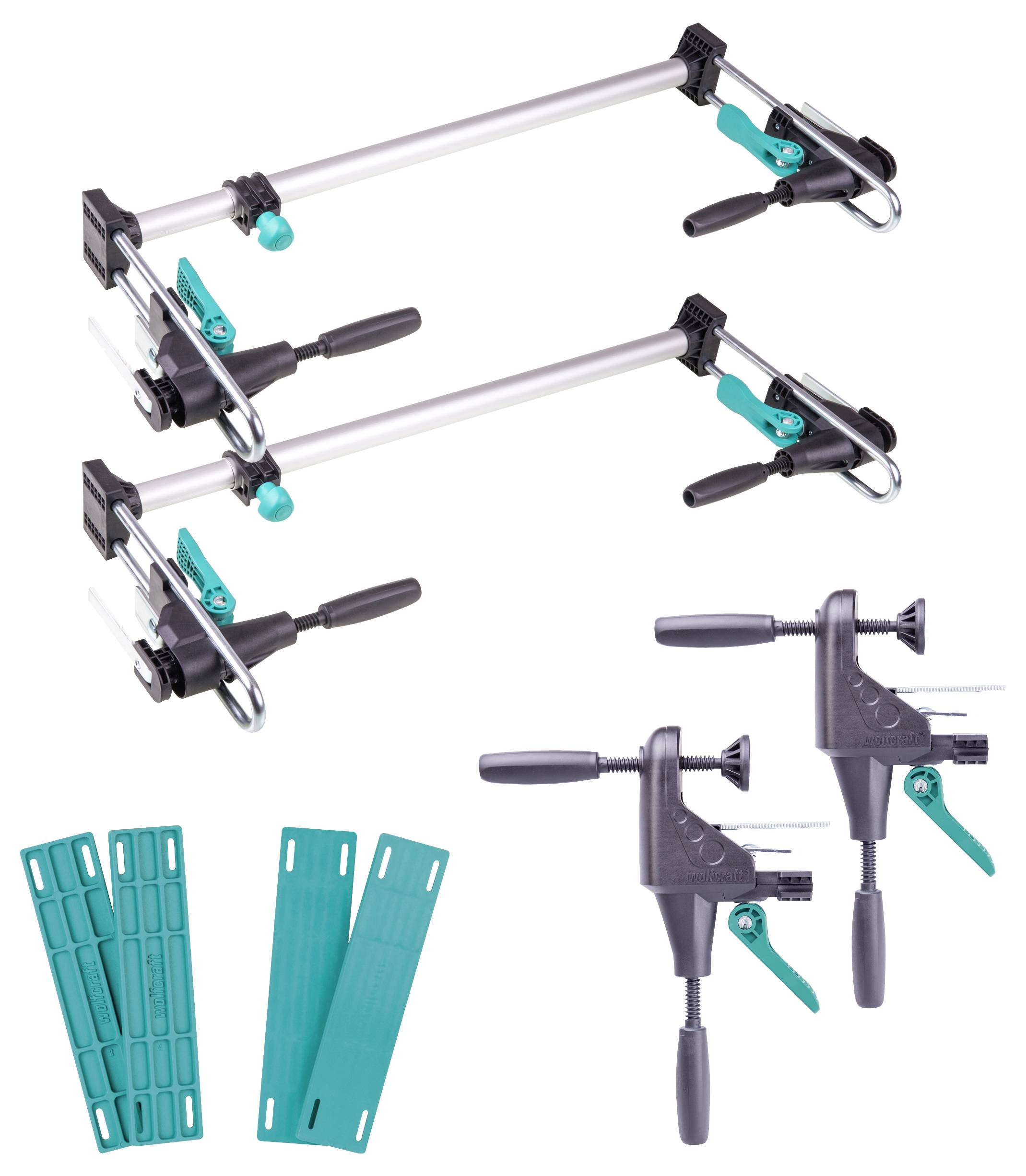 Dvije duge i dvije kratke stege s plavim ručkama, zajedno s plavim plastičnim umetcima, za pridržavanje radnih komada.