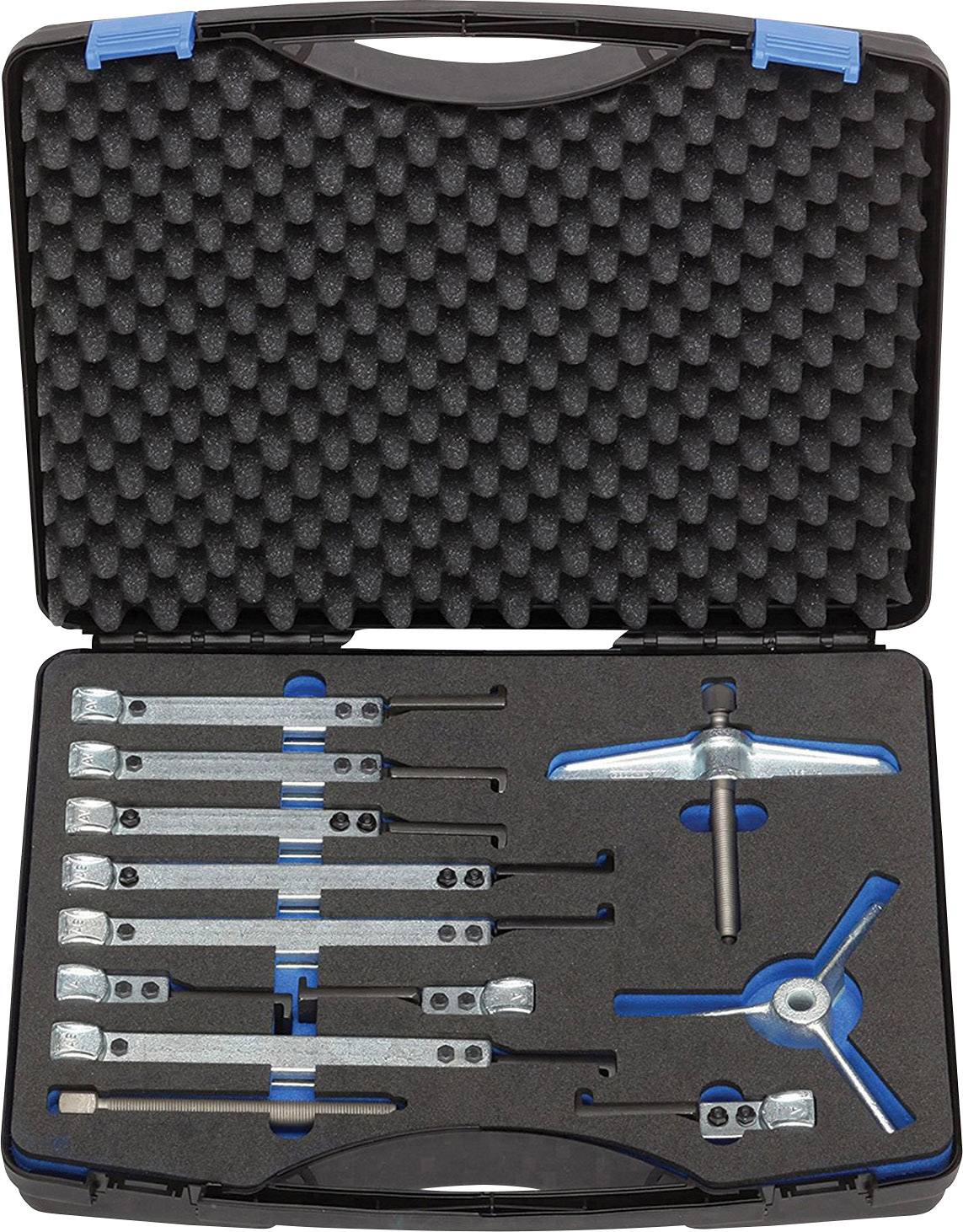 Otvoreni kovčeg za alat s raznim alatima, uključujući okretne ključeve i moment ključ, smješten u pjenastoj podlozi.