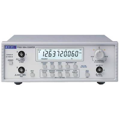 Elektronički mjerni uređaj, tip TF930 3GHz brojač, prikazuje frekvenciju '18263720060'. Nekoliko tipki i postavki na prednjoj ploči.