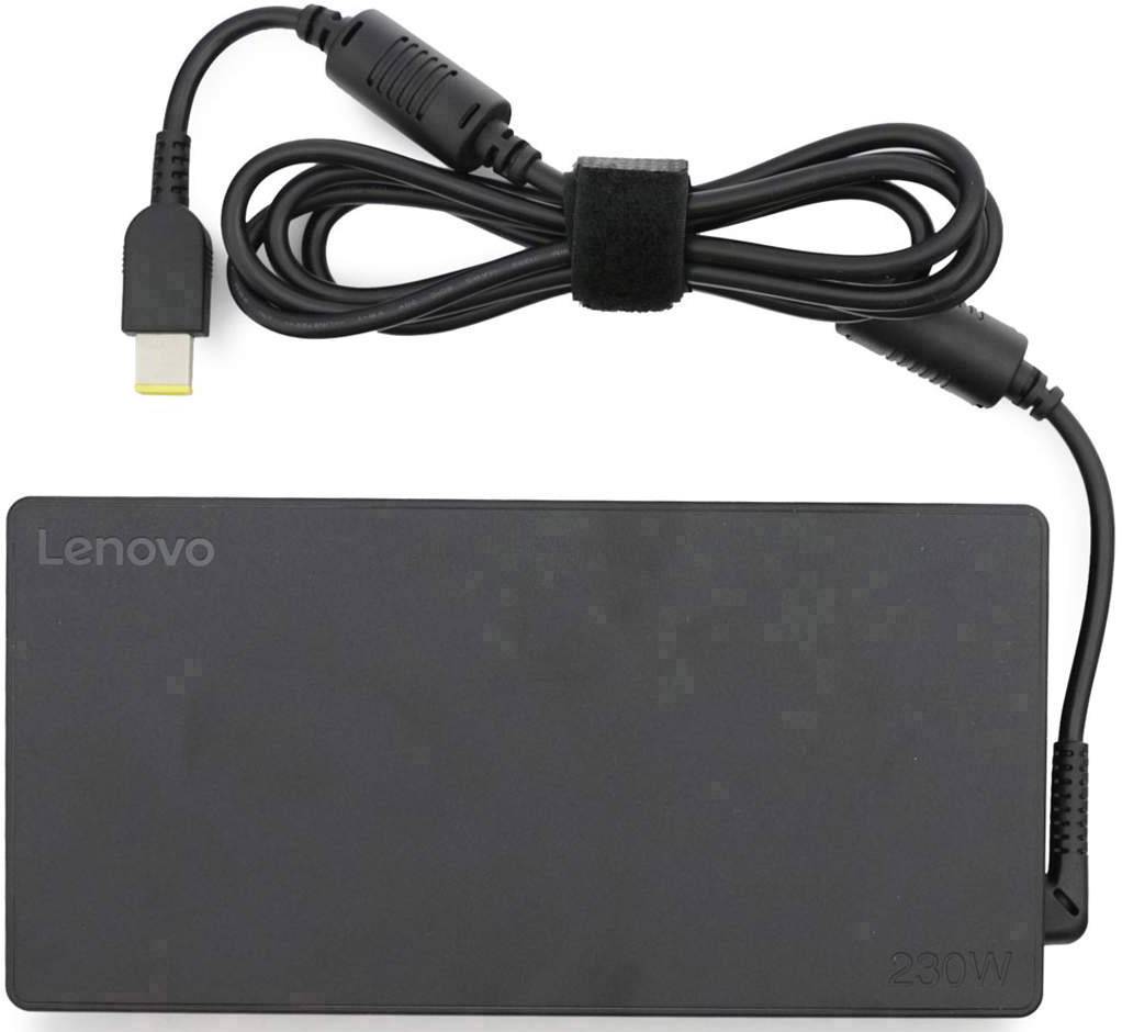 Crni Lenovo punjač snage 230W, priključeni kabel namotani gore.